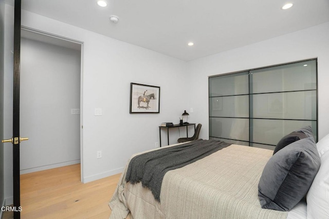 5622 Natick Ave, Sherman Oaks, CA 91411 - bedroom featuring light wood-style flooring, recessed lighting, and baseboards