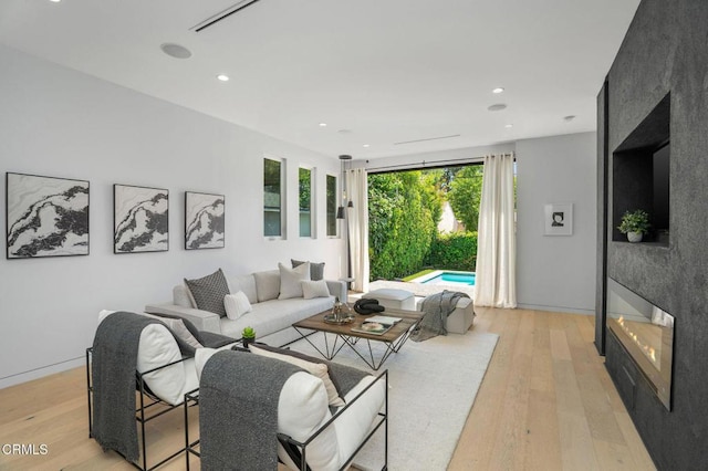5622 Natick Ave, Sherman Oaks, CA 91411 - living room with light wood-type flooring and recessed lighting