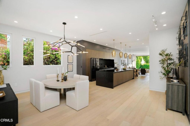 5622 Natick Ave, Sherman Oaks, CA 91411 - dining room featuring light wood-style flooring and recessed lighting