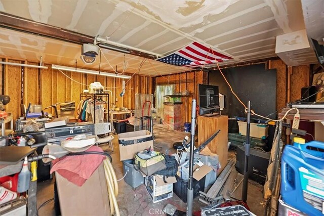1218 S Sultana Ave Unit A, Ontario, CA 91761 - garage featuring a garage door opener