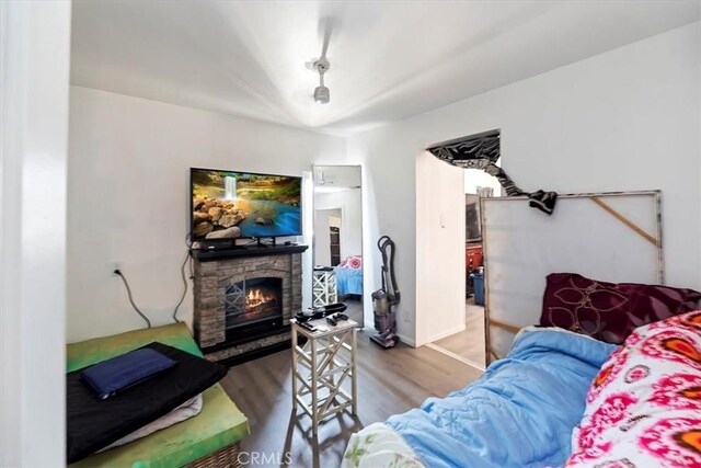 1218 S Sultana Ave Unit A, Ontario, CA 91761 - living room with wood finished floors and a fireplace
