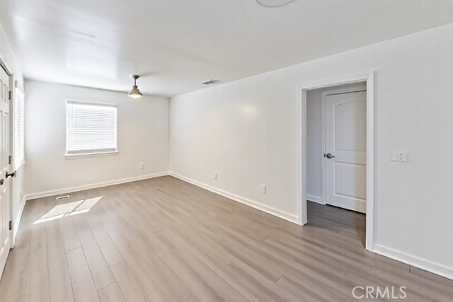 1218 S Sultana Ave Unit A, Ontario, CA 91761 - empty room featuring wood finished floors and baseboards