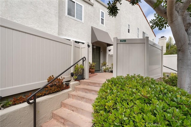 2916 Luciernaga St Unit A, Carlsbad, CA 92009 - doorway to property with stucco siding