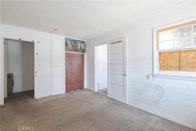 17196 Barbee St, Fontana, CA 92336 - unfurnished bedroom with carpet flooring, a textured ceiling, and a closet