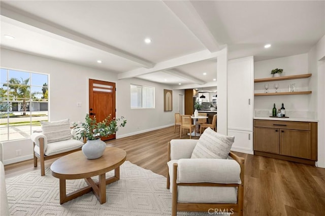 3629 W 144th St, Hawthorne, CA 90250 - living area featuring beamed ceiling, recessed lighting, light wood-style flooring, baseboards, and bar area