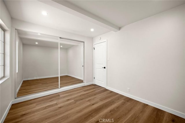 3629 W 144th St, Hawthorne, CA 90250 - unfurnished bedroom featuring wood finished floors, recessed lighting, baseboards, and a closet