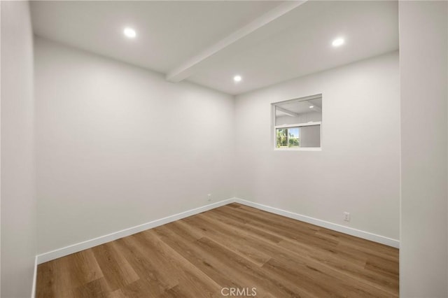 3629 W 144th St, Hawthorne, CA 90250 - empty room with wood finished floors, baseboards, recessed lighting, and beamed ceiling