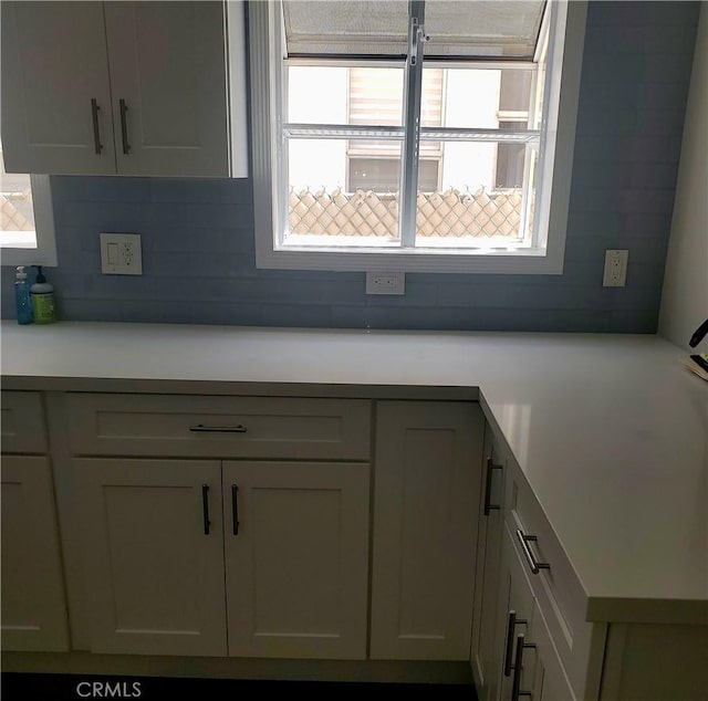 5846 Madden Ave, Los Angeles, CA 90043 - kitchen featuring decorative backsplash and light countertops