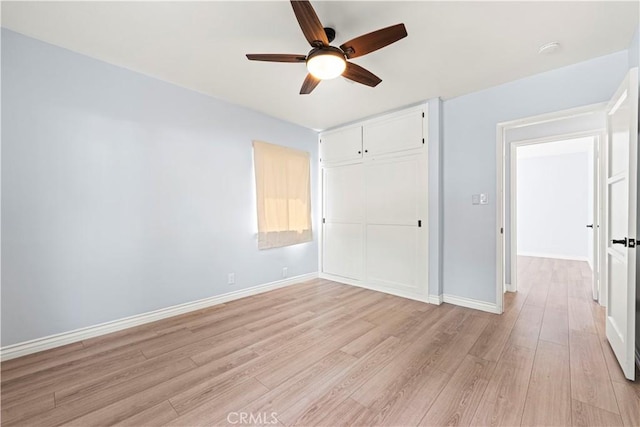 3316 Burritt Way, Glendale, CA 91214 - unfurnished bedroom with light wood-type flooring, a closet, baseboards, and a ceiling fan