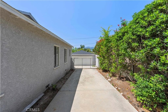 3316 Burritt Way, Glendale, CA 91214 - view of yard featuring a garage and a gate