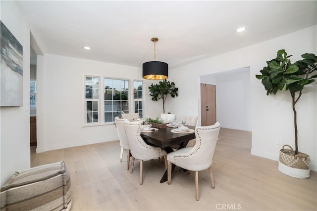 5560 Bradna Dr, Los Angeles, CA 90043 - dining area featuring light wood finished floors and recessed lighting
