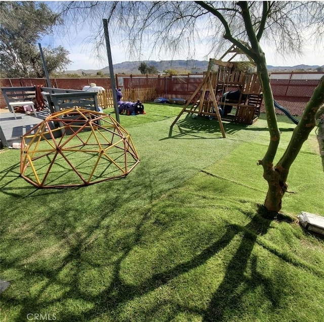 6683 Sherman Hoyt Ave Unit 29, Palms, CA 92277 - view of yard featuring a playground