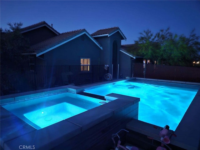 6683 Sherman Hoyt Ave Unit 29, Palms, CA 92277 - view of swimming pool with a pool with connected hot tub