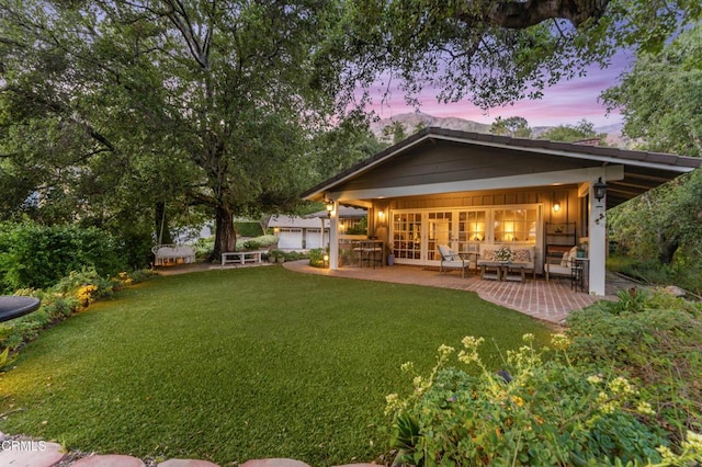 2210 Brambling Ln, Pasadena, CA 91107 - rear view of property featuring a yard and a patio area