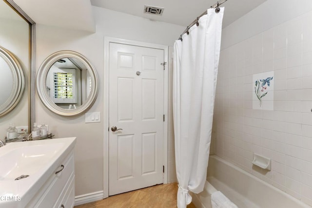 2210 Brambling Ln, Pasadena, CA 91107 - full bath featuring vanity, shower / bath combination with curtain, and tile patterned floors