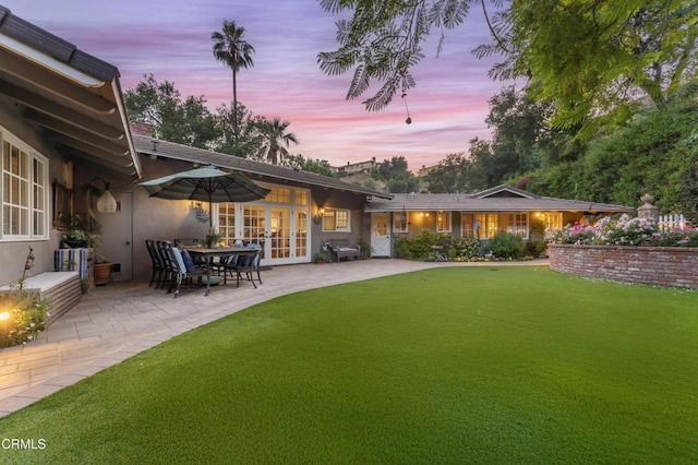 2210 Brambling Ln, Pasadena, CA 91107 - view of grassy yard featuring french doors and a patio area