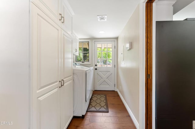 2210 Brambling Ln, Pasadena, CA 91107 - laundry room featuring dark wood-type flooring and washing machine and dryer