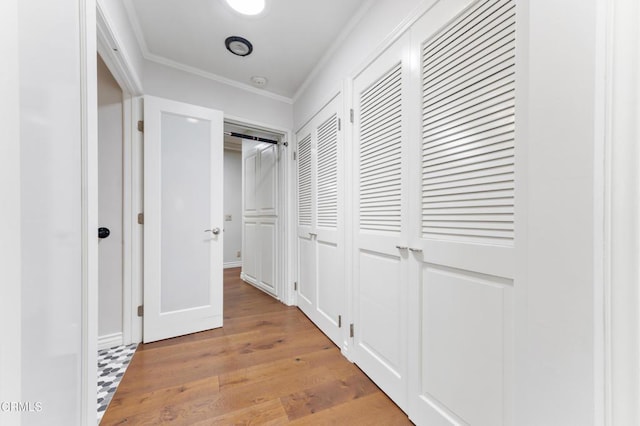 2210 Brambling Ln, Pasadena, CA 91107 - hallway with crown molding and light wood-style flooring