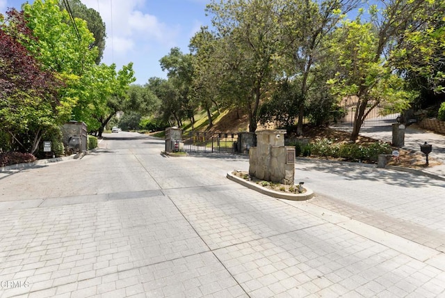 2210 Brambling Ln, Pasadena, CA 91107 - view of road with curbs, a gate, and a gated entry