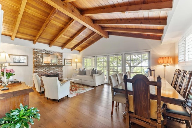 2210 Brambling Ln, Pasadena, CA 91107 - dining area featuring wood ceiling, hardwood / wood-style flooring, plenty of natural light, and a brick fireplace