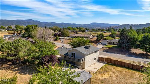 22150 Buena Vista St, Tehachapi, CA 93561 - aerial view of property and surrounding area featuring mountains