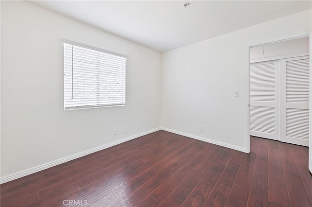 1707 Pepper St Unit A, Alhambra, CA 91801 - unfurnished bedroom featuring hardwood / wood-style flooring, baseboards, and a closet