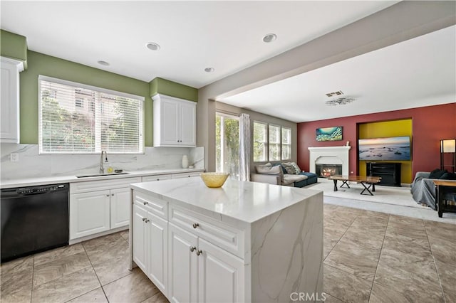 4127 Poplar Cir, Lake Elsinore, CA 92530 - kitchen with dishwasher, open floor plan, a lit fireplace, healthy amount of natural light, and recessed lighting