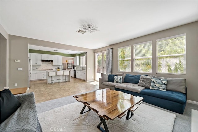 4127 Poplar Cir, Lake Elsinore, CA 92530 - living area with baseboards and light tile patterned flooring