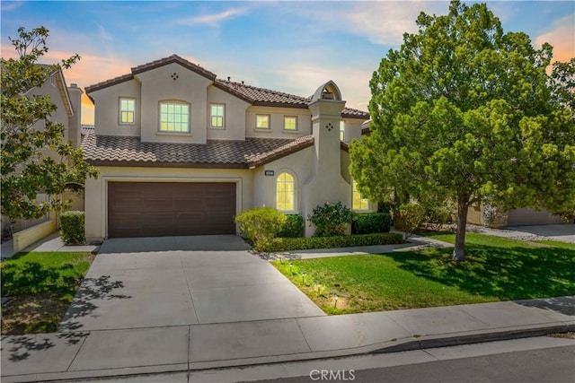 4127 Poplar Cir, Lake Elsinore, CA 92530 - mediterranean / spanish house with a tile roof, stucco siding, driveway, a yard, and an attached garage