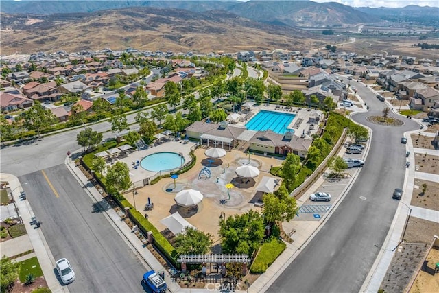 4127 Poplar Cir, Lake Elsinore, CA 92530 - aerial view of property and surrounding area featuring a pool area and nearby suburban area