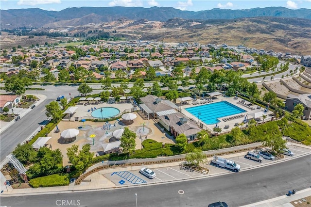 4127 Poplar Cir, Lake Elsinore, CA 92530 - drone / aerial view of a pool and a mountain backdrop
