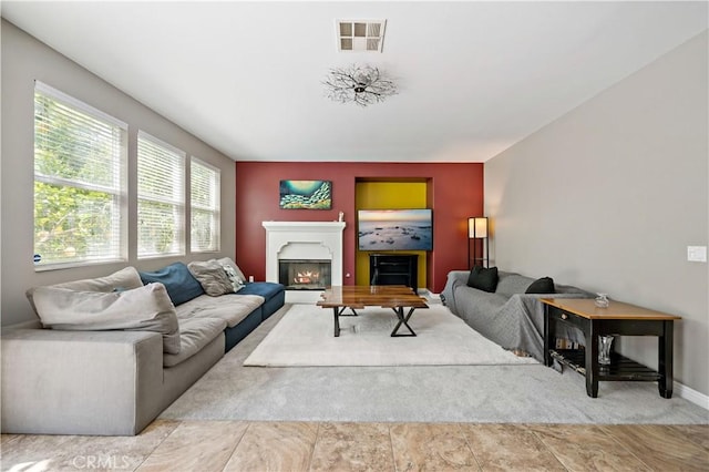 4127 Poplar Cir, Lake Elsinore, CA 92530 - living room with a glass covered fireplace and baseboards
