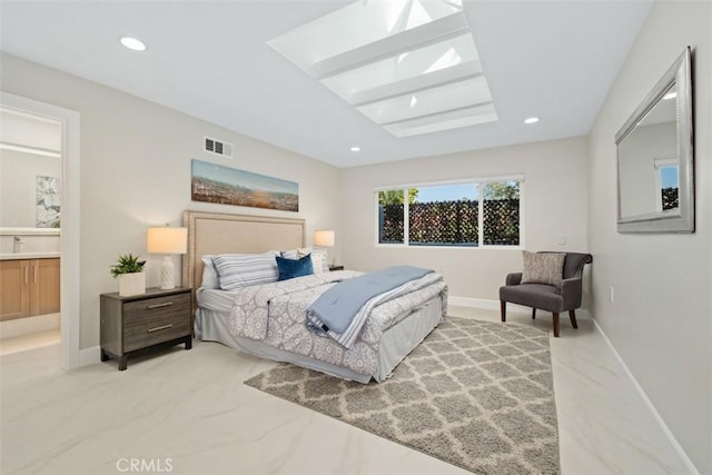 5437 Via Carrizo, Laguna Woods, CA 92637 - bedroom with baseboards, recessed lighting, a skylight, and ensuite bath