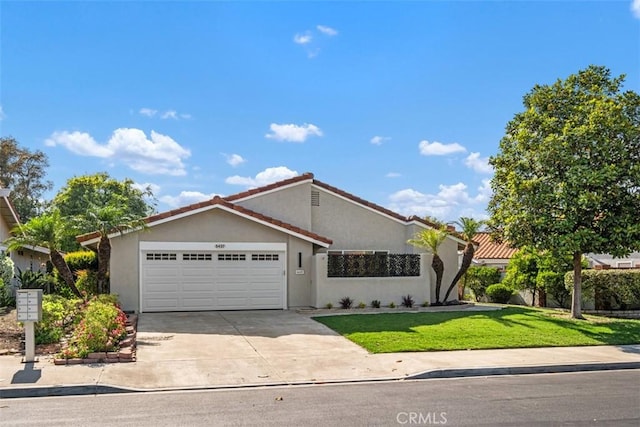 5437 Via Carrizo, Laguna Woods, CA 92637 - single story home with an attached garage, concrete driveway, stucco siding, a front lawn, and a tiled roof