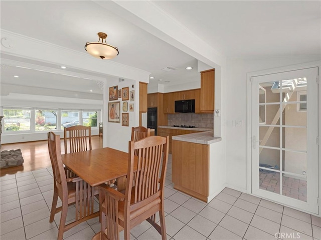 4854 Ranchito Ave, Sherman Oaks, CA 91423 - dining area with light tile patterned floors and recessed lighting