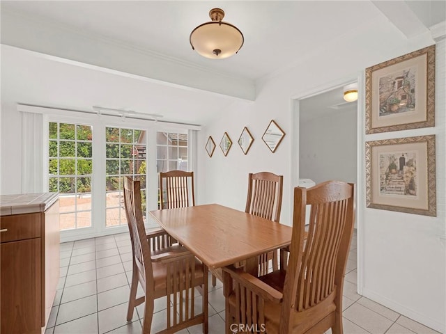 4854 Ranchito Ave, Sherman Oaks, CA 91423 - dining room with light tile patterned floors and ornamental molding