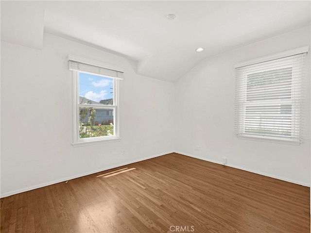 4854 Ranchito Ave, Sherman Oaks, CA 91423 - unfurnished room with wood finished floors, baseboards, and lofted ceiling