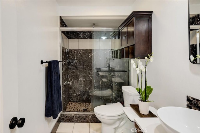 3605 W Hidden Ln Unit 307, Rolling Hills Estates, CA 90274 - bathroom with toilet, a marble finish shower, tile patterned flooring, and vanity