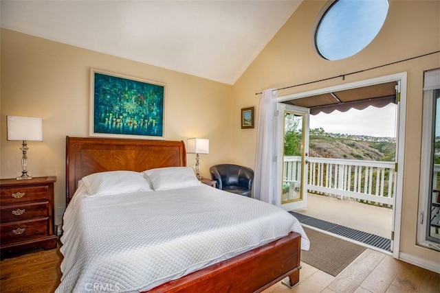 4 Amherst, Laguna Niguel, CA 92677 - bedroom with access to exterior, wood finished floors, and vaulted ceiling