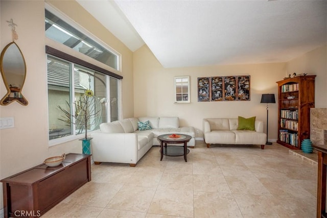 4 Amherst, Laguna Niguel, CA 92677 - living room with plenty of natural light, lofted ceiling, and light tile patterned flooring
