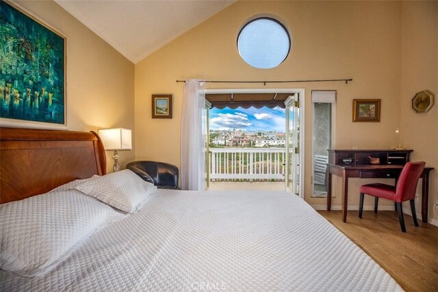 4 Amherst, Laguna Niguel, CA 92677 - bedroom featuring access to exterior, wood finished floors, baseboards, and high vaulted ceiling