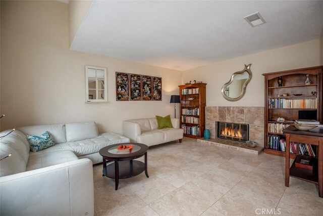 4 Amherst, Laguna Niguel, CA 92677 - living area featuring a premium fireplace and light tile patterned floors
