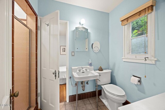 346 Stedman Pl, Monrovia, CA 91016 - bathroom featuring a stall shower and tile patterned flooring