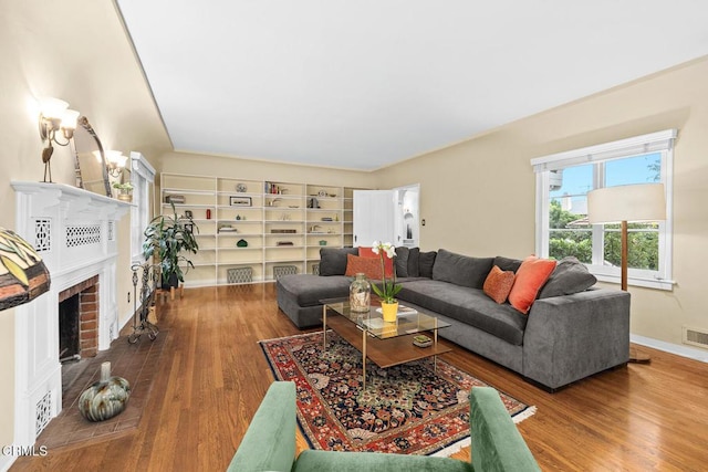 346 Stedman Pl, Monrovia, CA 91016 - living room featuring wood finished floors and a fireplace