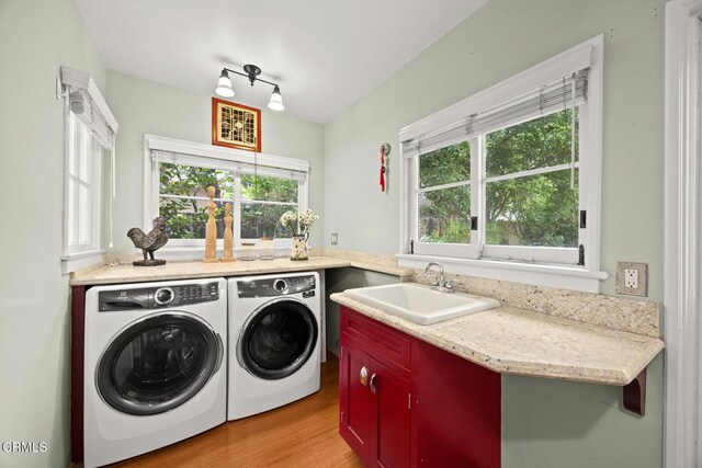 346 Stedman Pl, Monrovia, CA 91016 - washroom with washing machine and clothes dryer and light wood-style floors