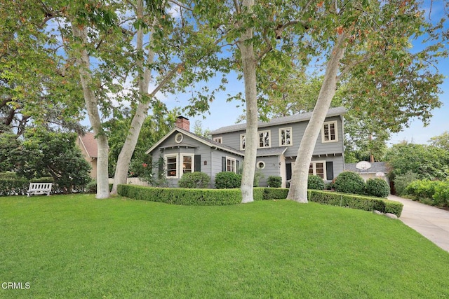 346 Stedman Pl, Monrovia, CA 91016 - view of front of property with a front lawn, a chimney, and driveway