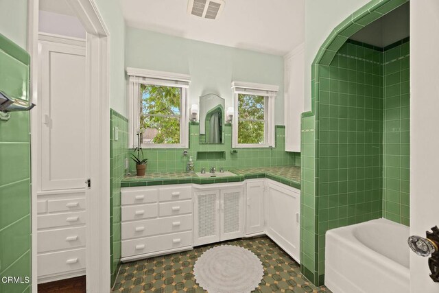 346 Stedman Pl, Monrovia, CA 91016 - bathroom with vanity and decorative backsplash