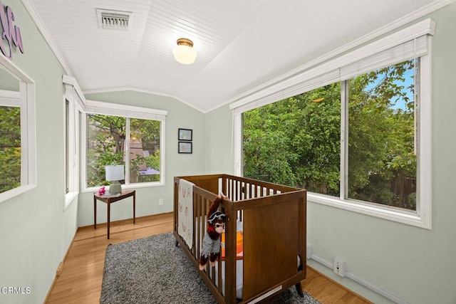 346 Stedman Pl, Monrovia, CA 91016 - bedroom featuring lofted ceiling, light wood-type flooring, and a crib