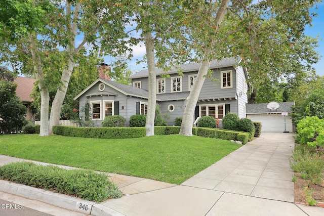 346 Stedman Pl, Monrovia, CA 91016 - traditional-style house with a front yard, an outbuilding, a garage, and roof with shingles