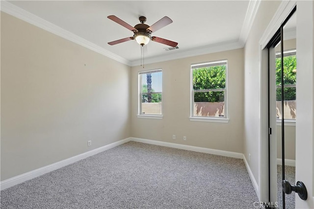 13045 Ridgewood Way, Chowchilla, CA 93610 - empty room featuring carpet flooring, ornamental molding, baseboards, and a ceiling fan
